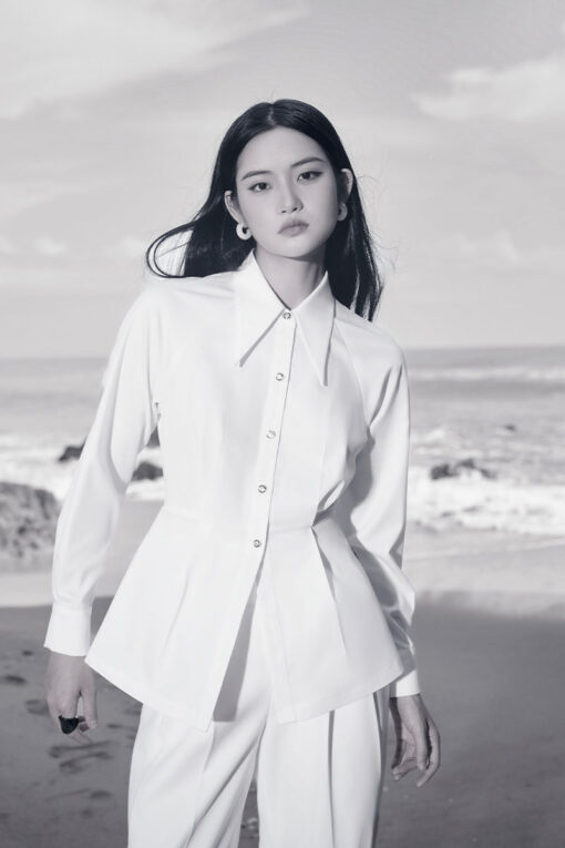 Sơ mi DT tay raglan xẻ gấu sau