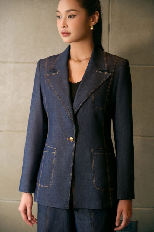 Áo vest giả bò chần chỉ xẻ tay đính cúc