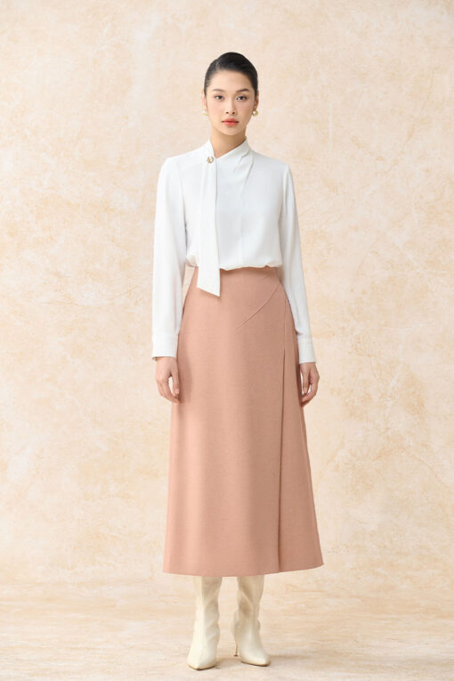 Chân váy xoè cạp liền tạo ly đổ múi lệch