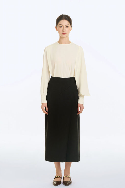 Chân váy xoè cạp liền tạo ly đổ múi lệch