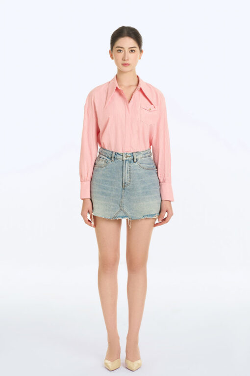 Chân váy jean A moi cong gấu rách