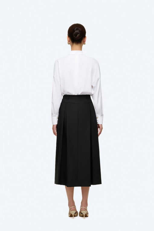 Chân váy xoè xếp ly cá 1 bên đính cúc