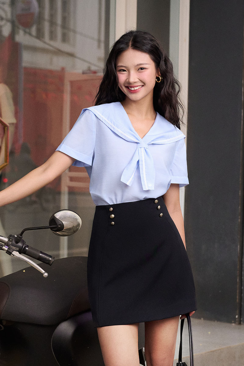 Chân váy A can bổ đính cúc TT