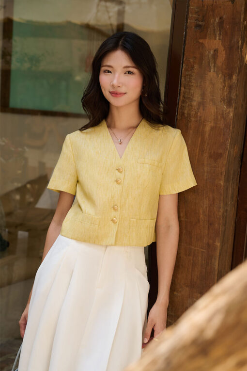 Áo kiểu CT croptop cúc đôi túi ốp gấu