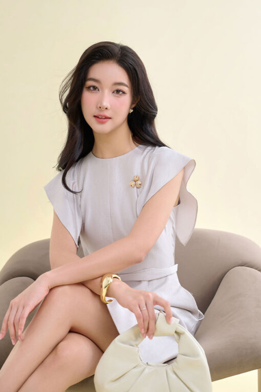 Đầm A tay bong ngực đính cúc trang trí