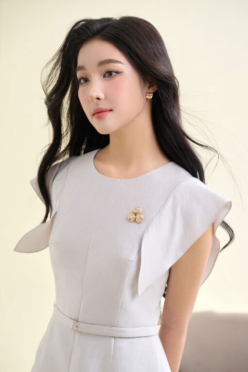 Đầm A tay bong ngực đính cúc trang trí