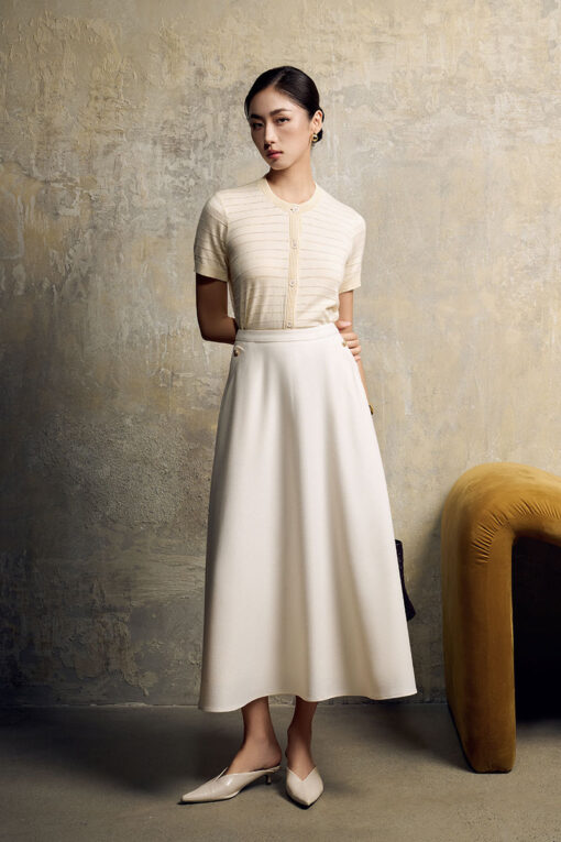 Chân váy xoè bong miệng túi đính cúc