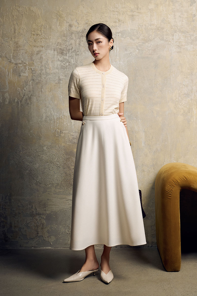 Chân váy xoè bong miệng túi đính cúc