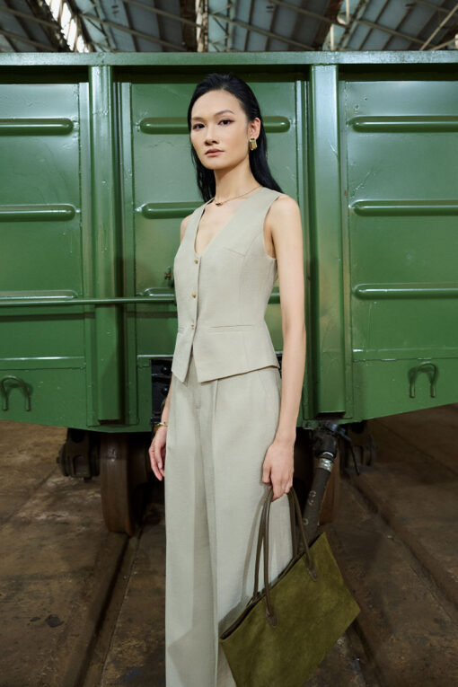 Áo gile cổ trứng bổ cơi túi trang trí