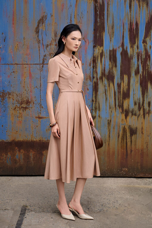 Đầm xoè đai eo đính cúc trang trí