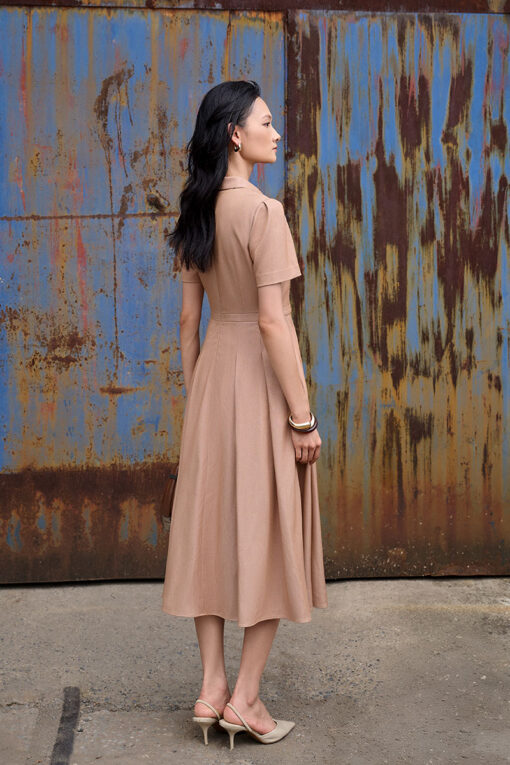 Đầm xoè đai eo đính cúc trang trí