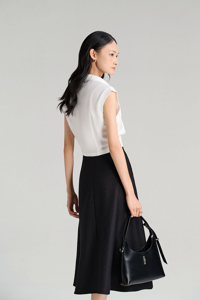 Chân váy xoè bong miệng túi đính cúc