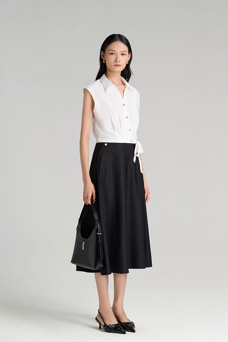 Chân váy xoè bong miệng túi đính cúc