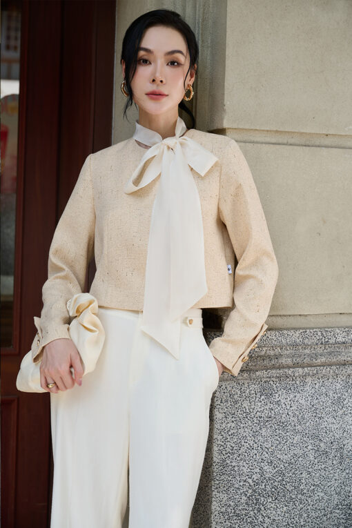 Áo kiểu croptop vạt lệch tay đính cúc