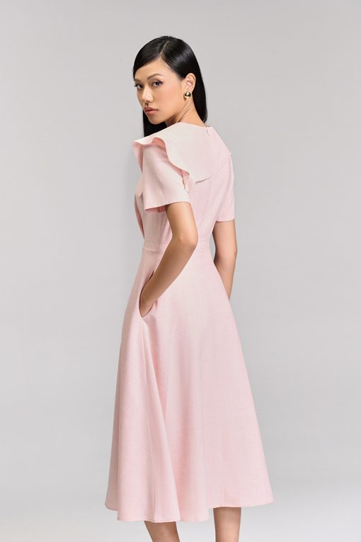 Đầm xoè bong ngực đính cúc trang trí