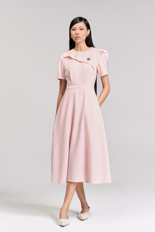 Đầm xoè bong ngực đính cúc trang trí