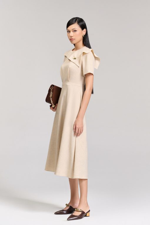 Đầm xoè bong ngực đính cúc trang trí