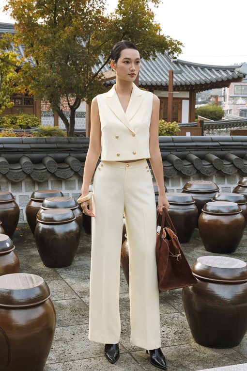 Quần suông túi chéo đính cúc