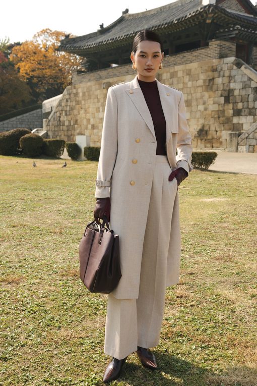 Áo măng tô cổ cách điệu đính cúc