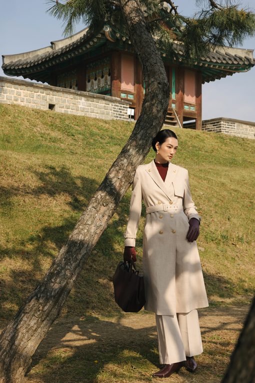 Áo măng tô cổ cách điệu đính cúc