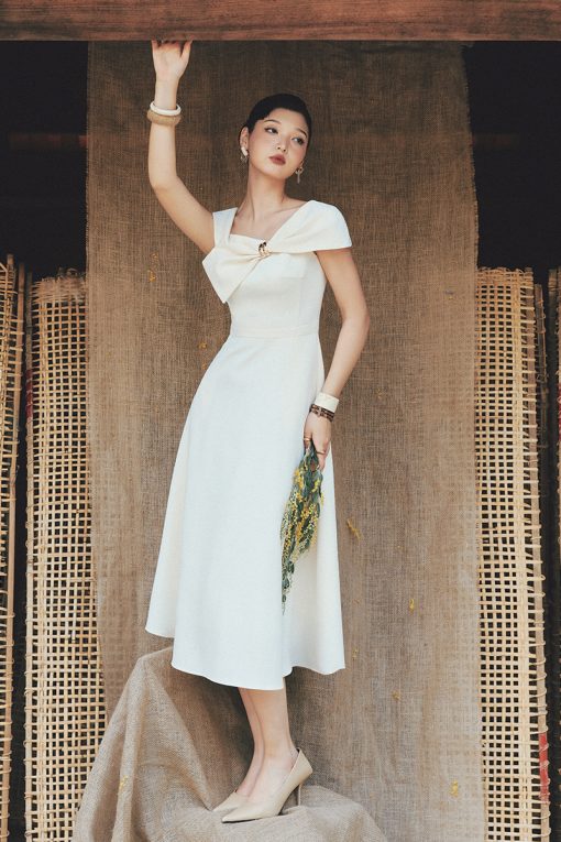 Đầm party nơ liền tay luồn khoen